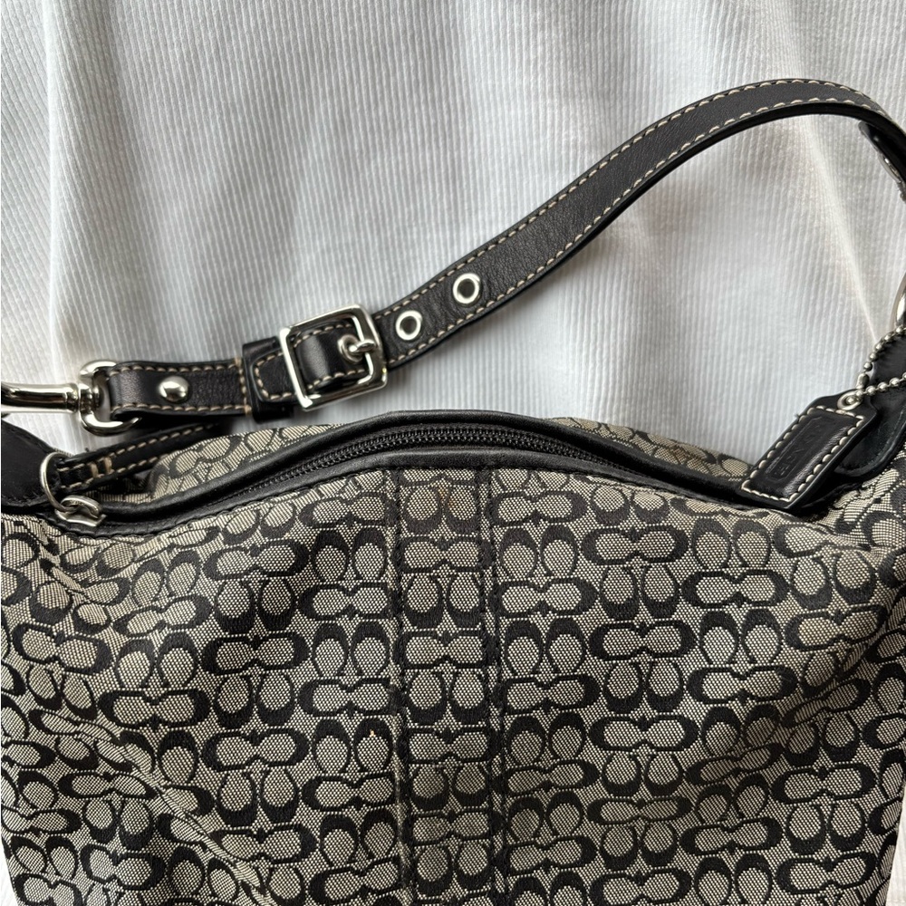 Coach mini hand Bag in Black and  cream Signature Jacquard